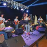 On stage with the band