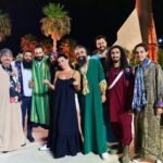 With the band